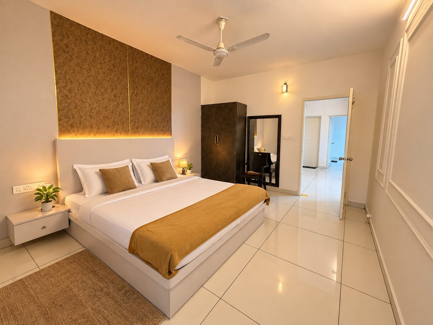 A second 2 BHK bedroom with soft lighting and a calm, light-filled interior